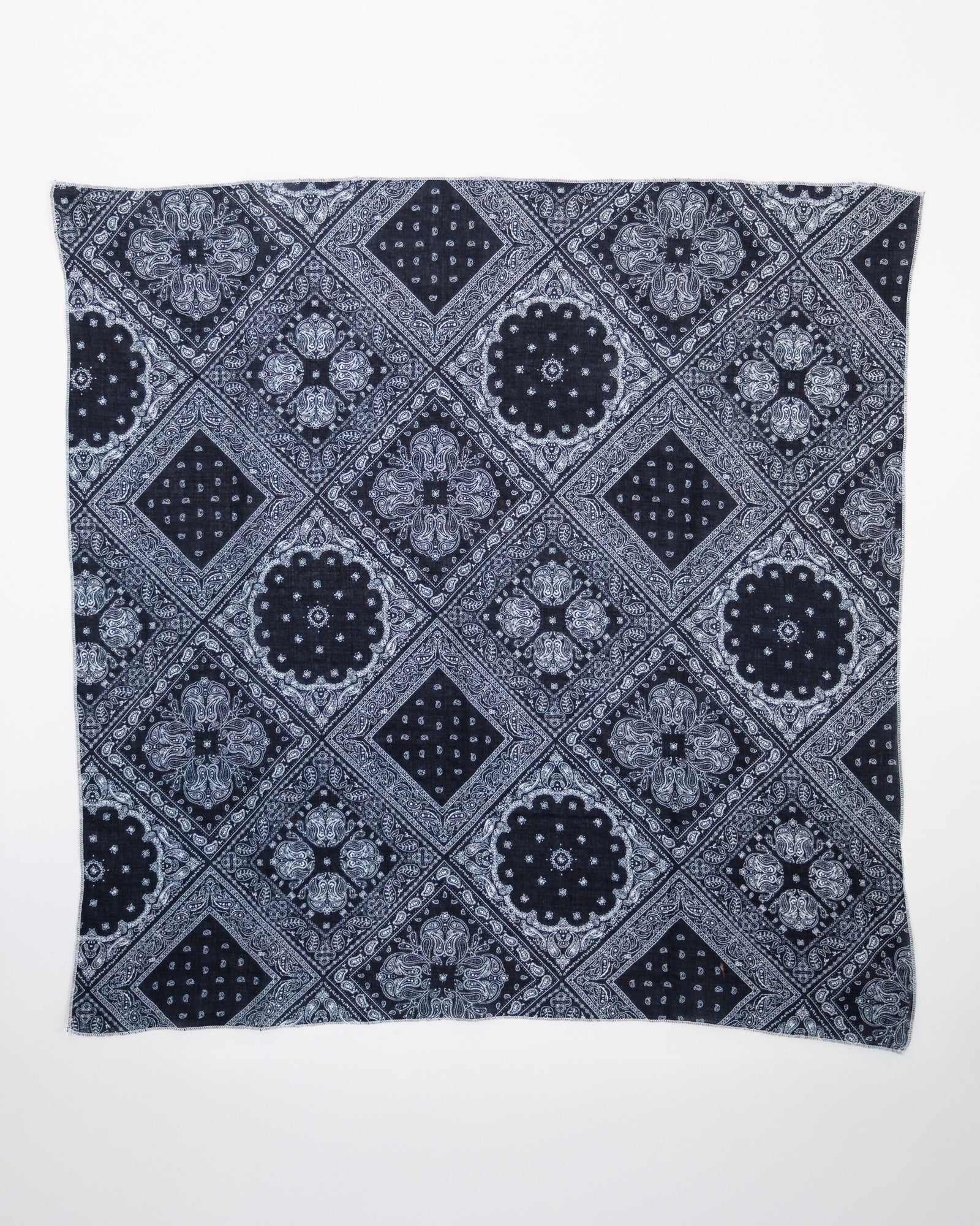 Flat lay image of a floral printed scarf