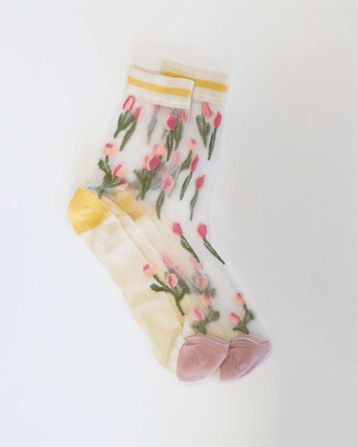 Sheer socks with floral design on a white background