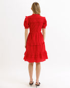 Red dress with puff sleeves on a white background