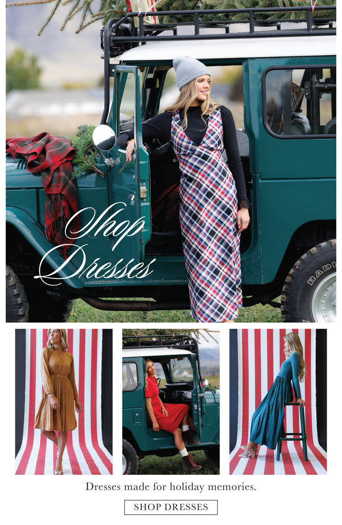 Woman in plaid dress standing next to a vintage truck with 'Shop Dresses' text overlay.