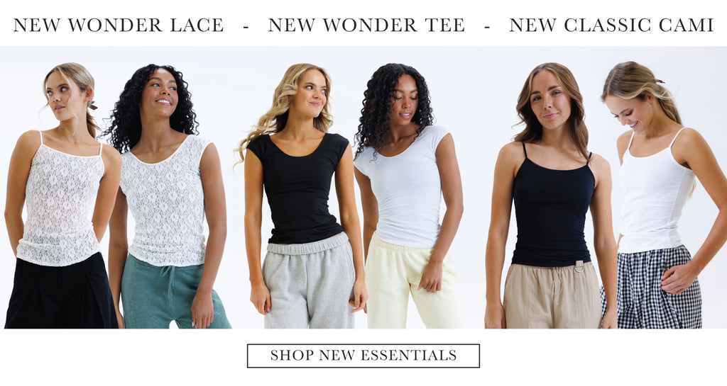 Promotional image of women wearing various layering tops with "Shop New Essentials" text.
