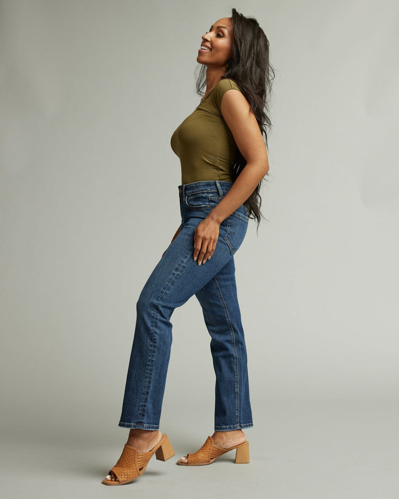 Woman in mid-rise straight jeans