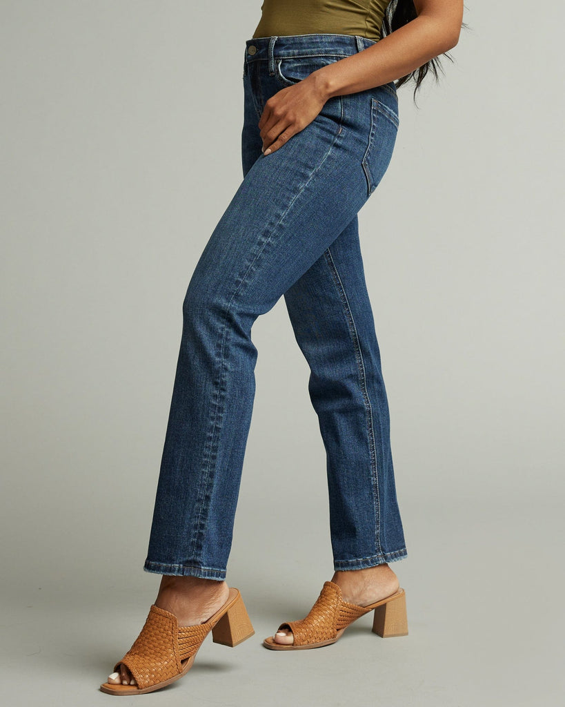 Woman in mid-rise straight jeans