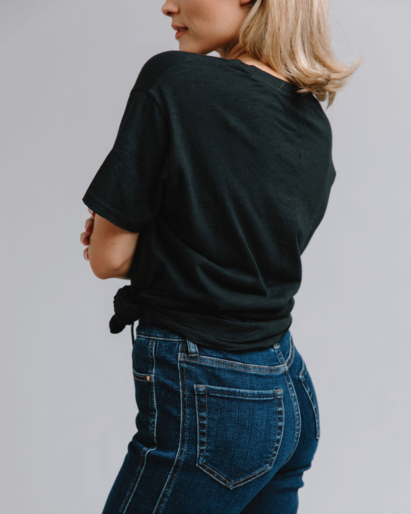 Woman in mid-rise blue jeans