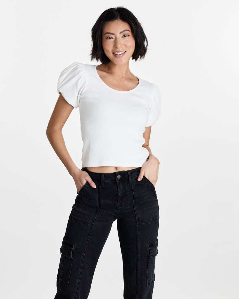 Woman in a white short sleeve t-shirt