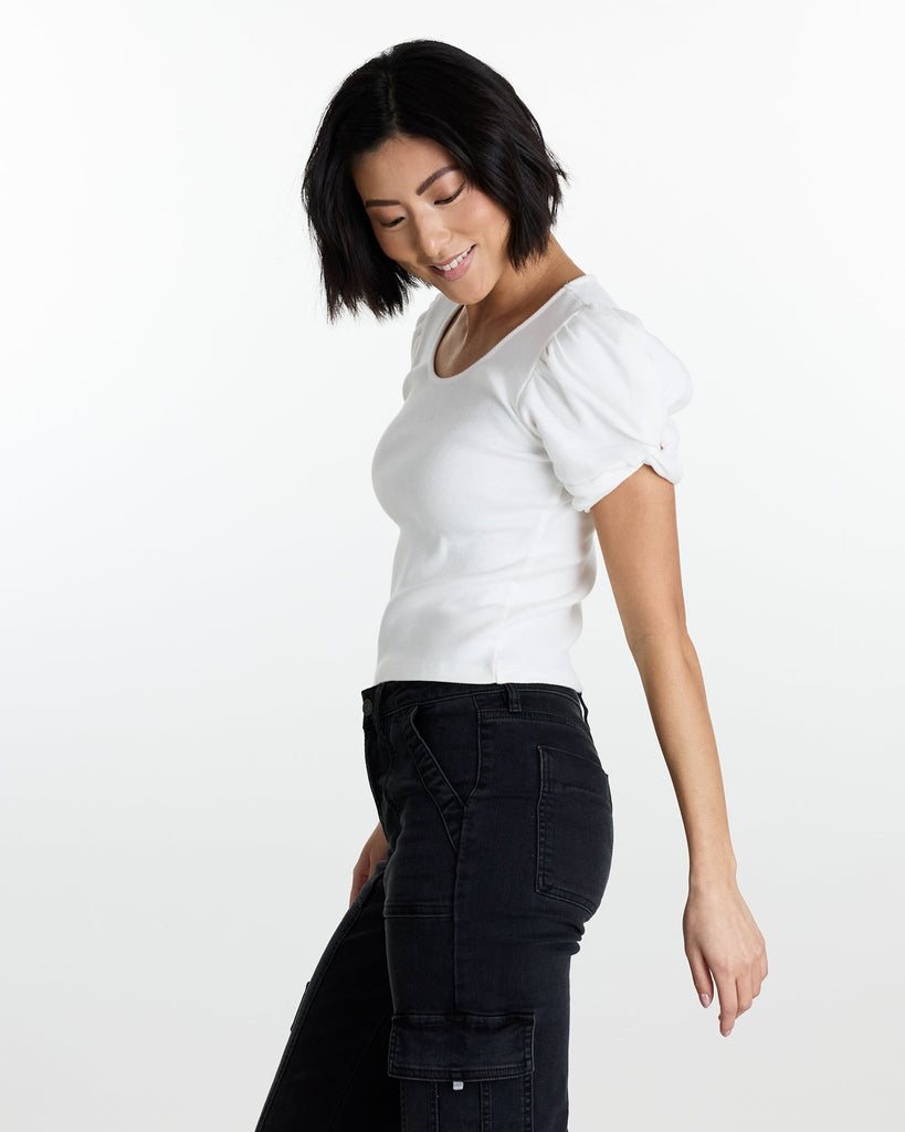 Woman in a white short sleeve t-shirt