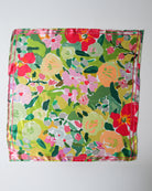 Colorful floral patterned fabric on a white background