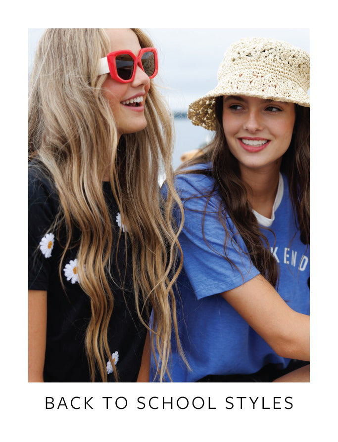 Two women sitting together with text 'Back to School Styles' at the bottom.