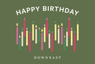 Downeast E-Gift Card with white text that says 'Happy Birthday' and has colorful candles on a green background