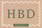 Downeast E-Gift Card with green text that says 'HBD' on a beige background
