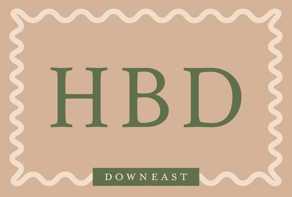 Downeast E-Gift Card with green text that says 'HBD' on a beige background
