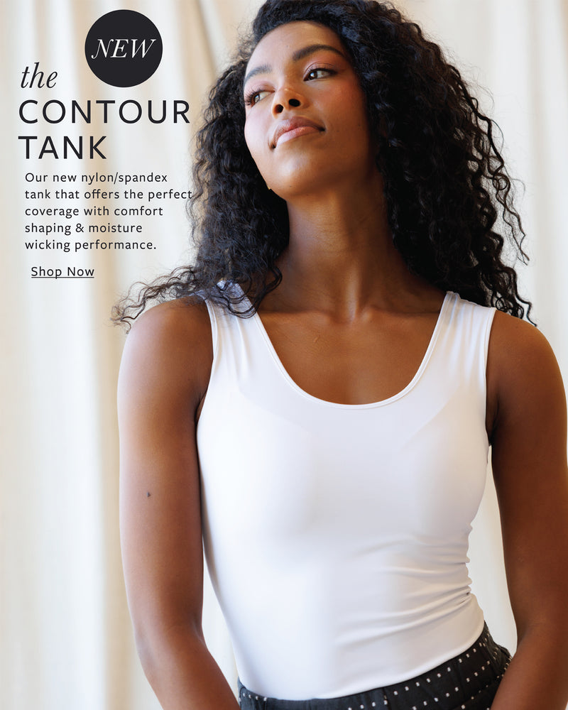 Woman wearing a white tank top with promotional text about 'The Contour Tank' on a beige background.