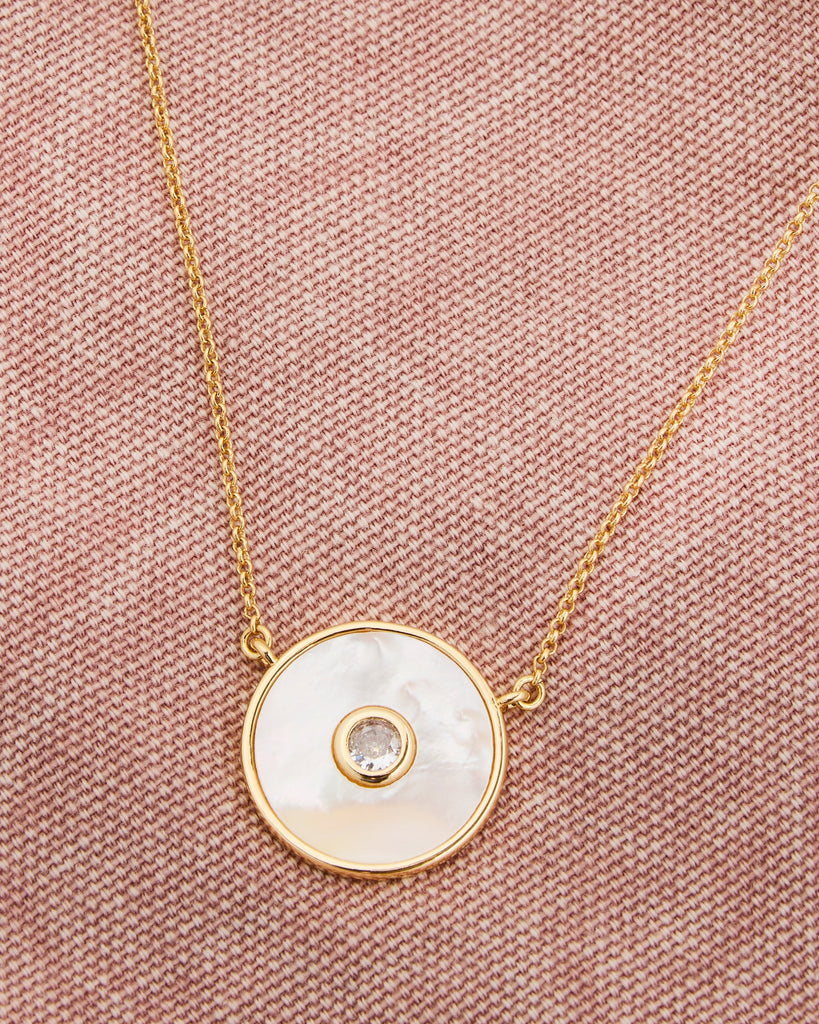 Gold chain necklace with circle pendant