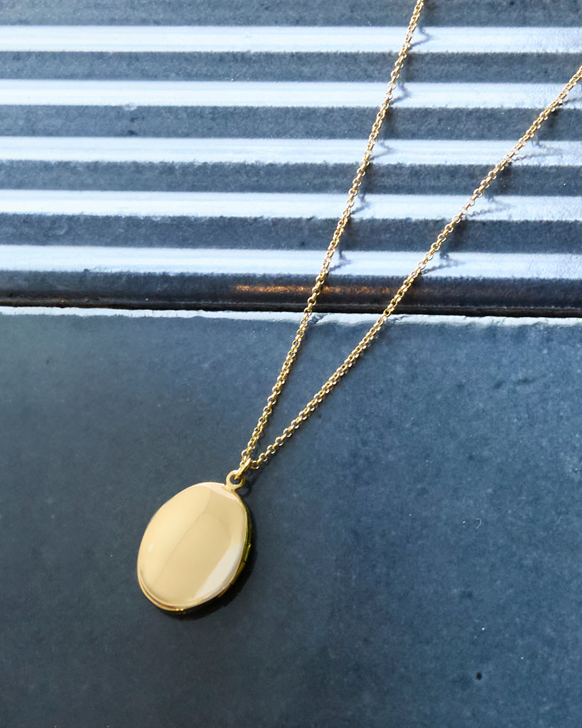 Gold chain necklace with locket