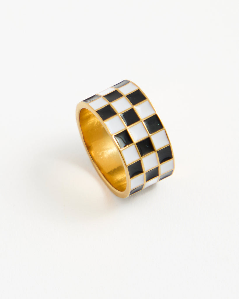 Black and white checkered gold ring