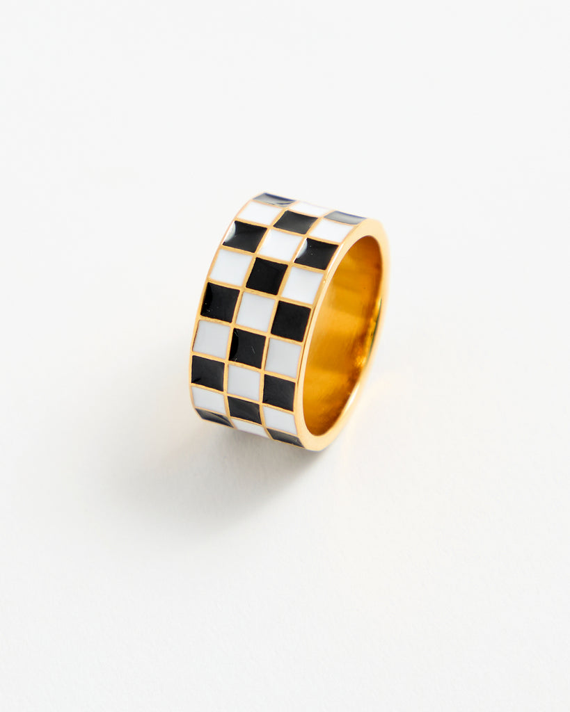 Black and white checkered gold ring