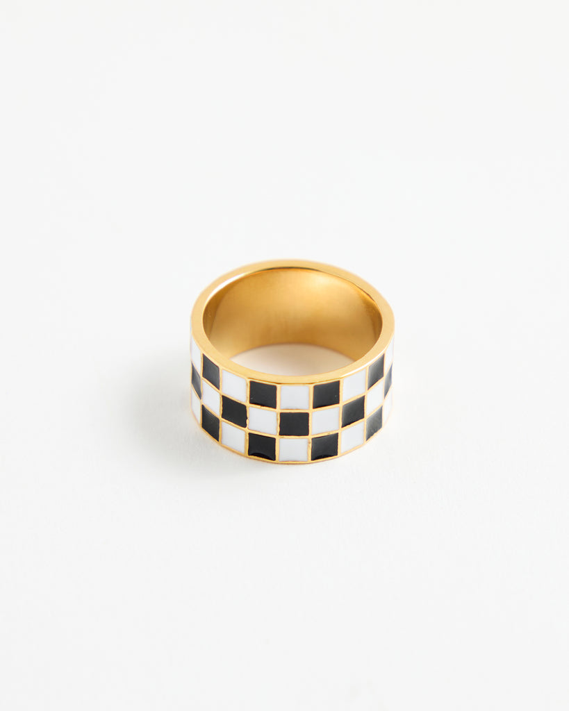 Black and white checkered gold ring