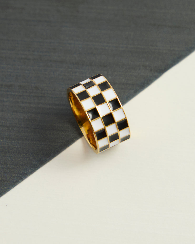 Black and white checkered gold ring