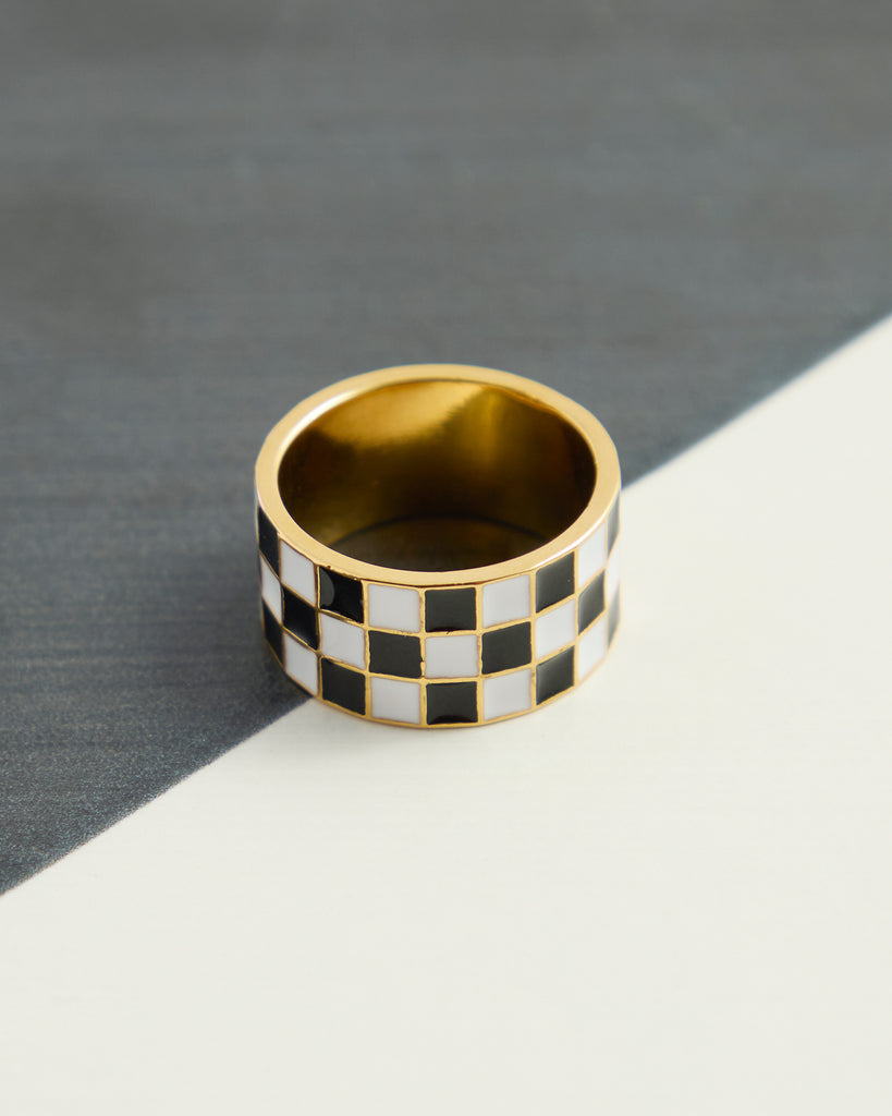 Black and white checkered gold ring