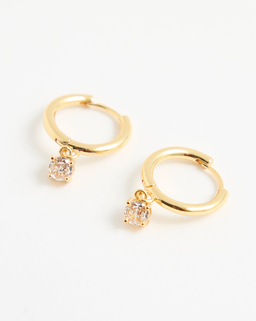 Gold hoop earrings with cubic zirconia gem