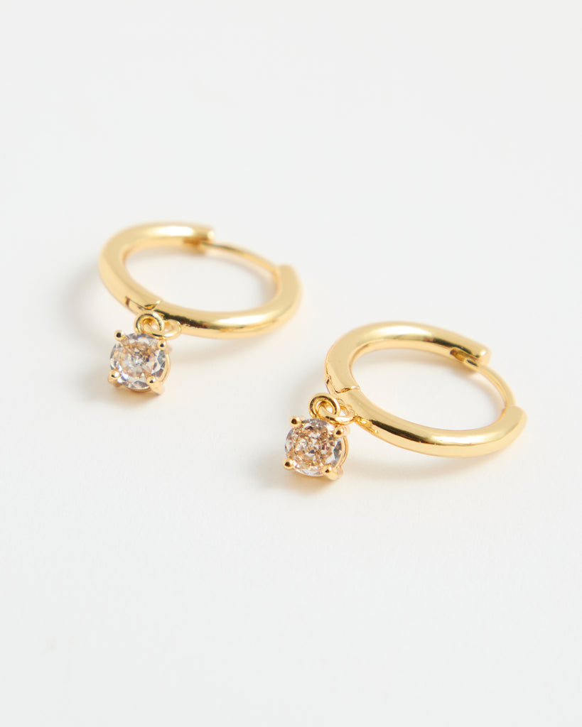 Gold hoop earrings with cubic zirconia gem