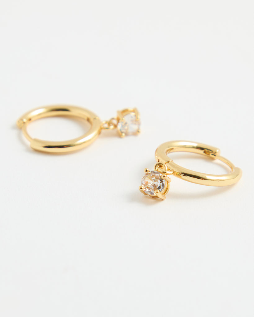 Gold hoop earrings with cubic zirconia gem