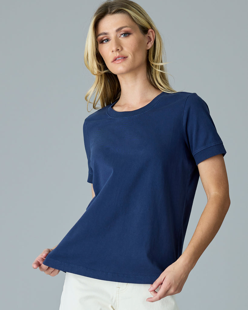 Woman in a navy basic t-shirt