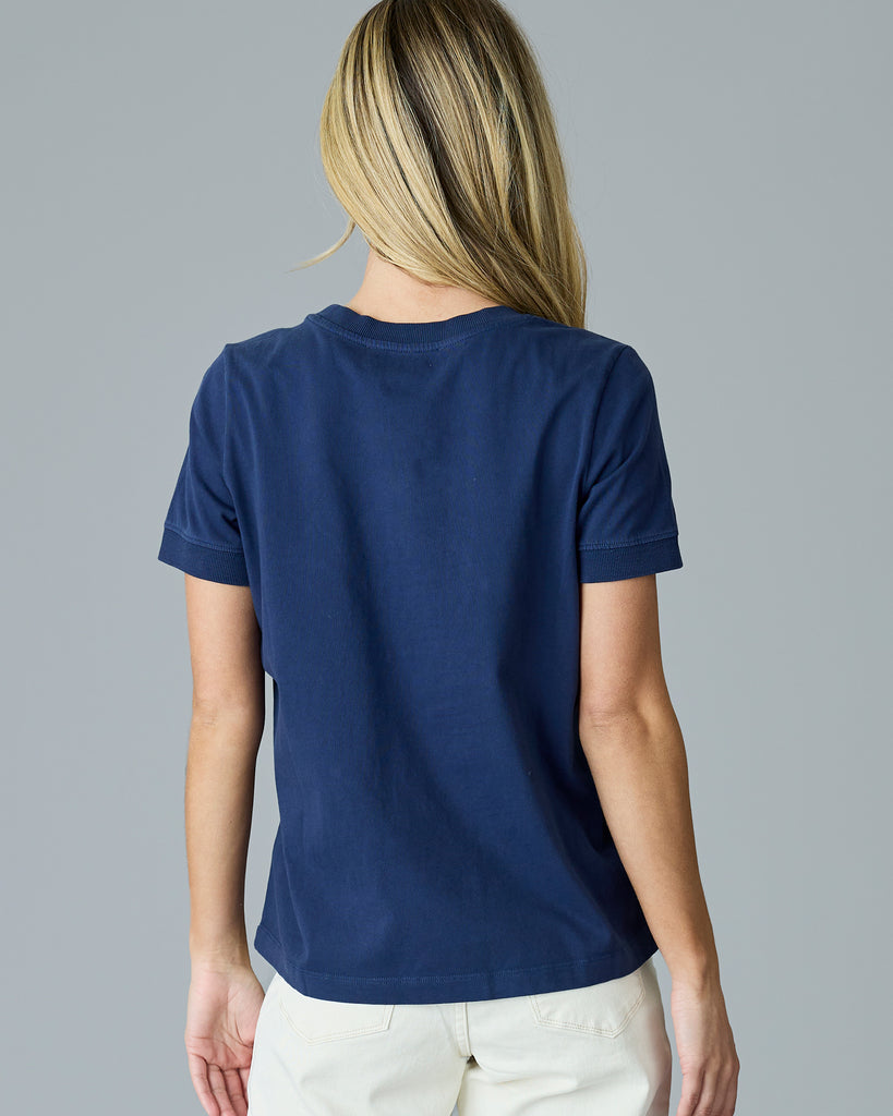 Woman in a navy basic t-shirt