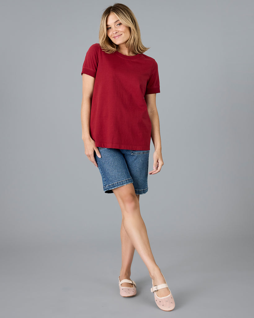 Woman in a red short sleeve basic tee