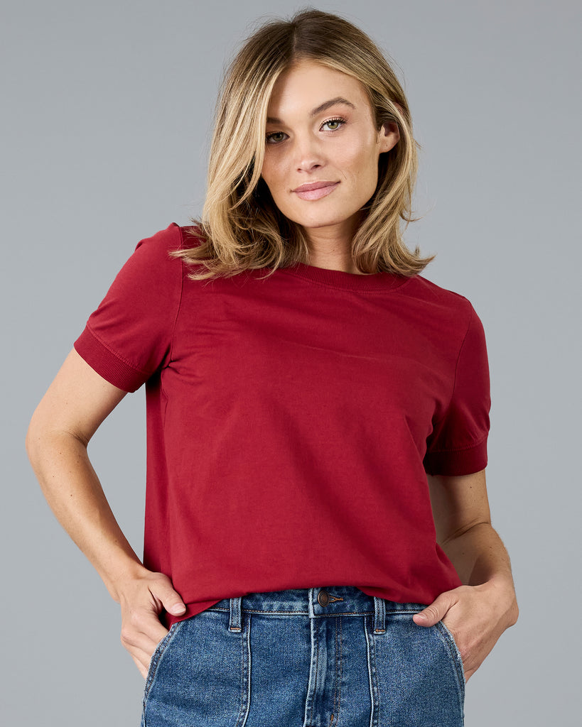 Woman in a red short sleeve basic tee