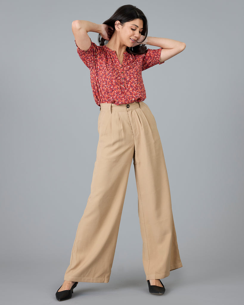 Woman in beige trousers