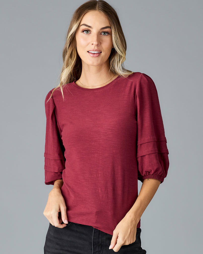 Woman in a red half sleeved tshirt