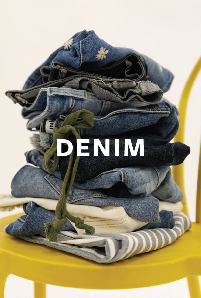 Image of stacked denim with DENIM text