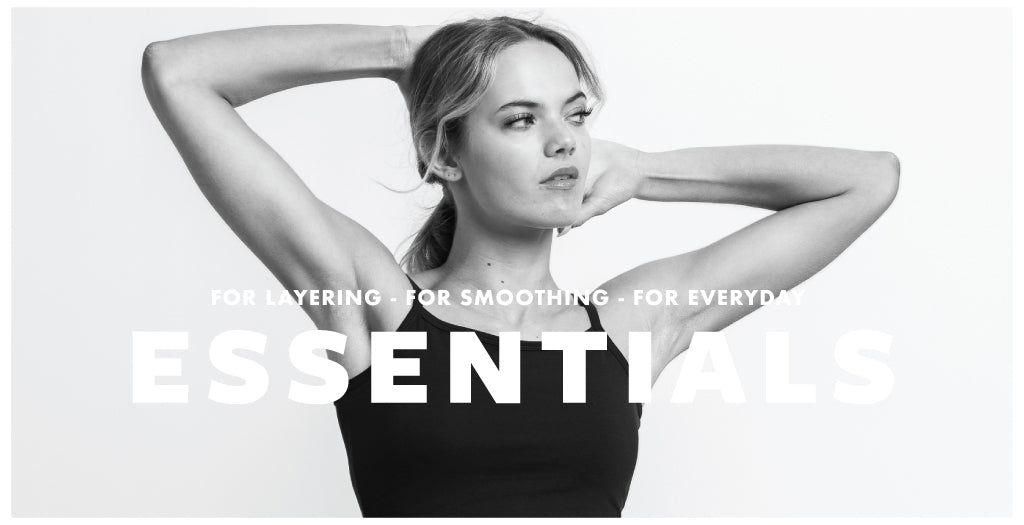 Woman in black tank top with text 'ESSENTIALS' on a white background