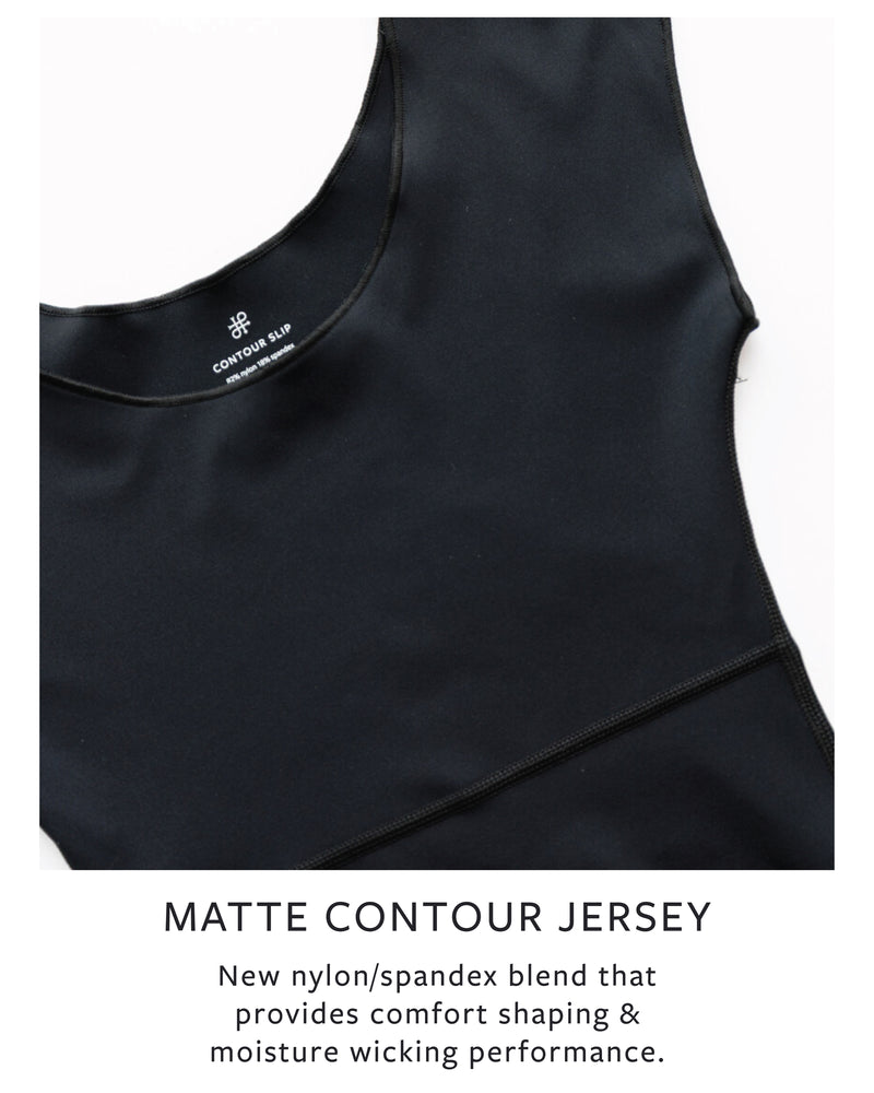 Flat lay of black fabric on a white surface with text describing matte jersey material.