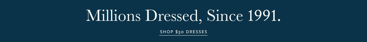A dark teal banner with white serif text reading 'Millions Dressed, Since 1991.' and smaller text below reading 'SHOP $50 DRESSES'.