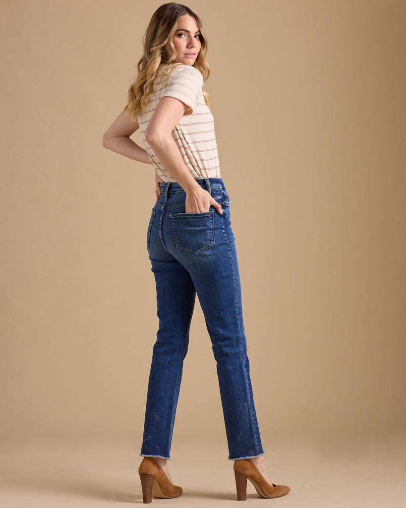 Woman in blue hi-rise straight jeans