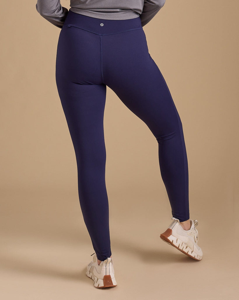 Woman in navy highwaisted leggings