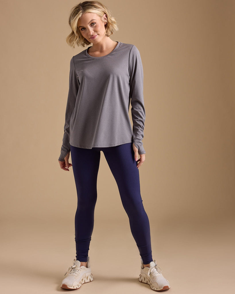 Woman in a grey long sleeve tshirt