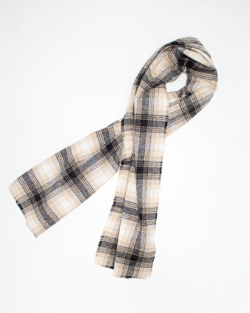 Plaid scarf with beige and black pattern on a white background